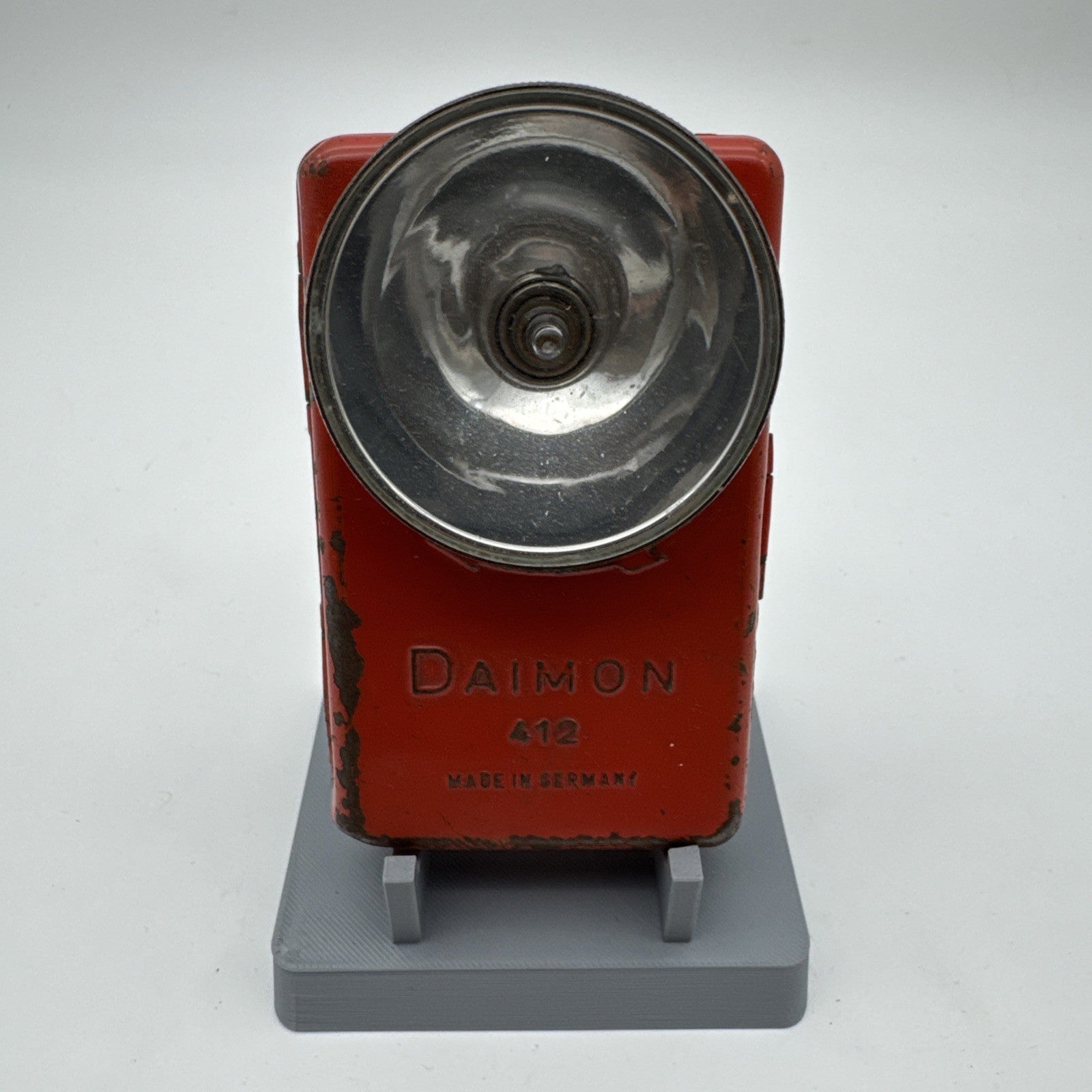 Daimon 412 Taschenlampe Made in Germany Leuchte Blech 11cm Orange Rot Vintage